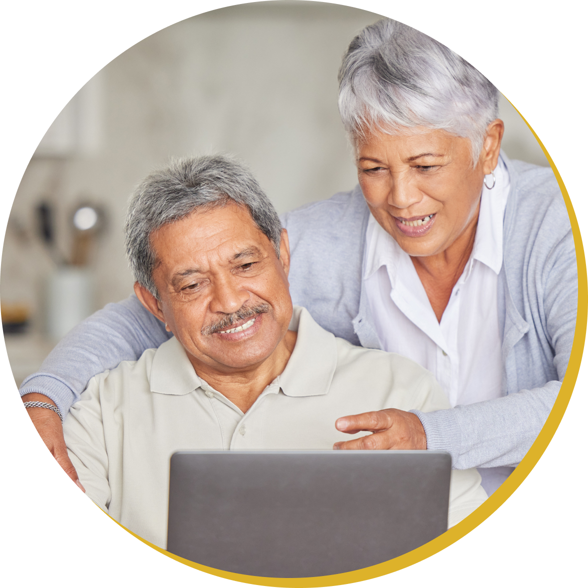 latino couple looking at computer